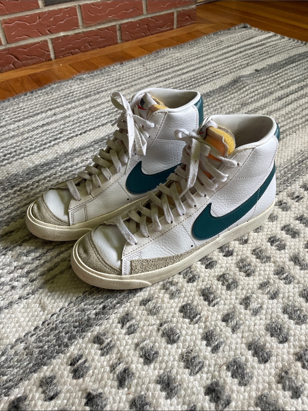 Nike White High-Top Sneakers with Teal Swoosh